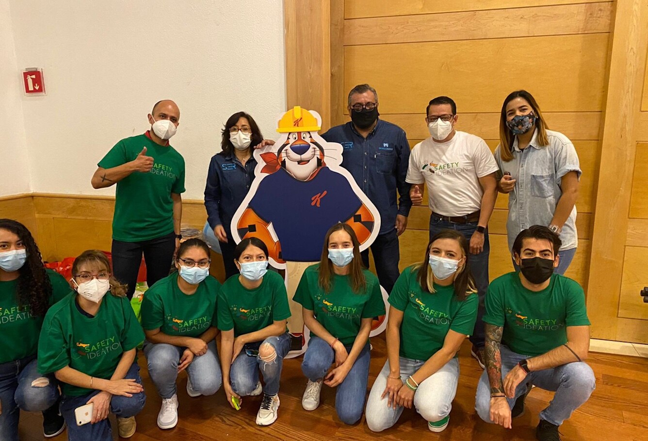 Kellanova Trainees pictured with hard hat Tony the Tiger