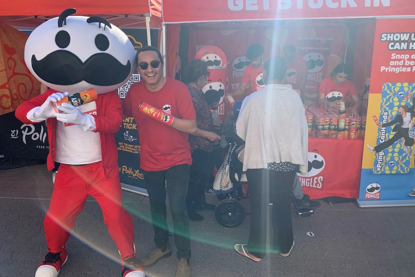 Josh Tari with Pringles Mr. P mascot